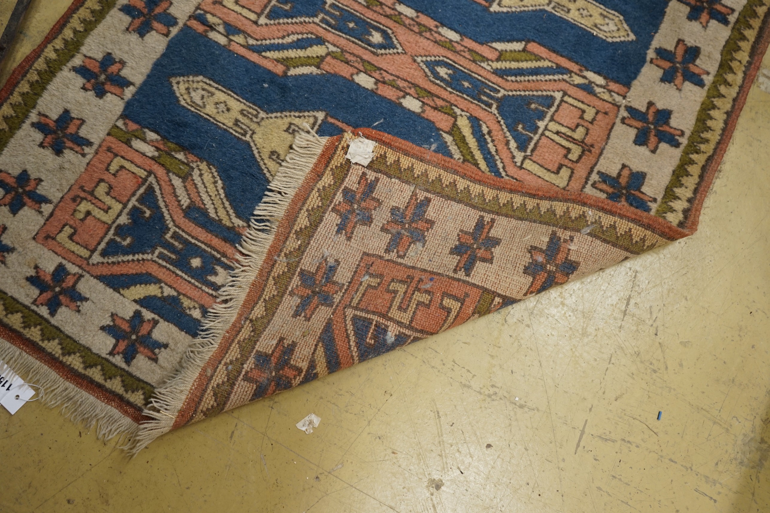 A Caucasian style blue ground runner, 264 x 90cm